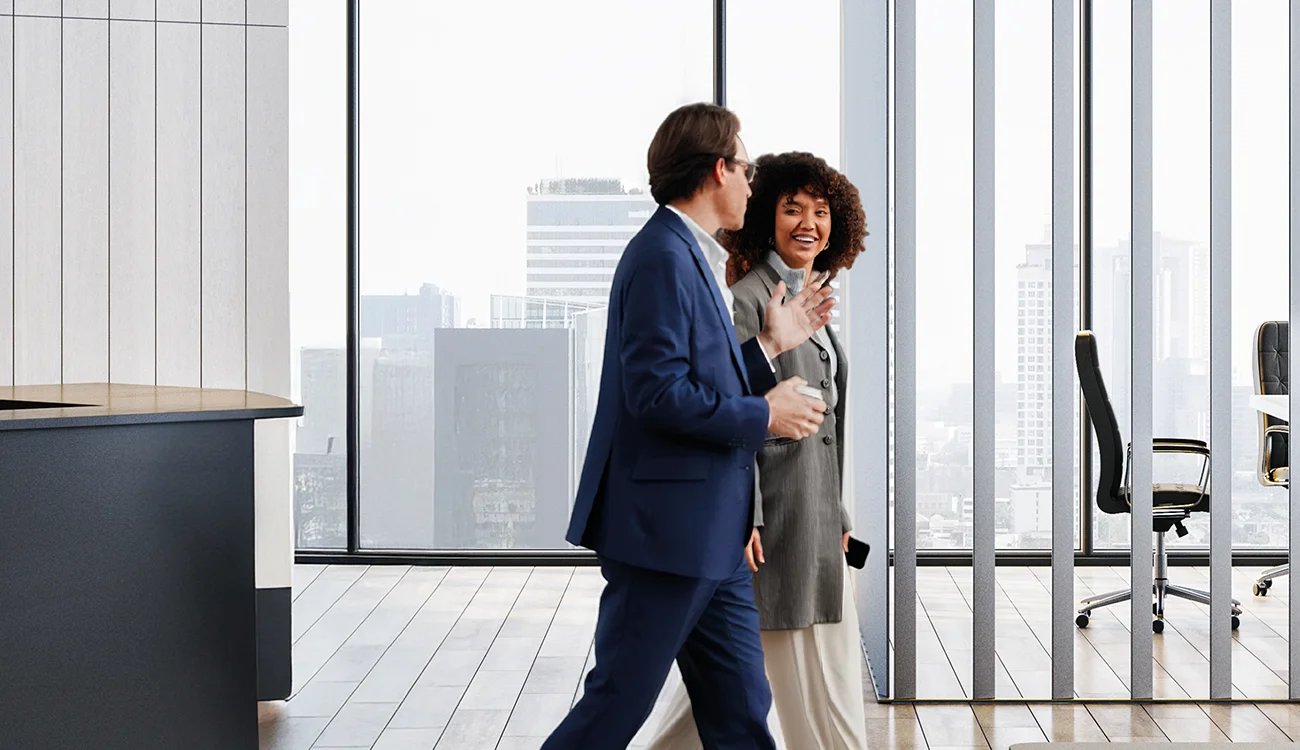 Two people working in factory