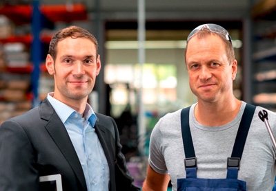 Two manufacturing individuals