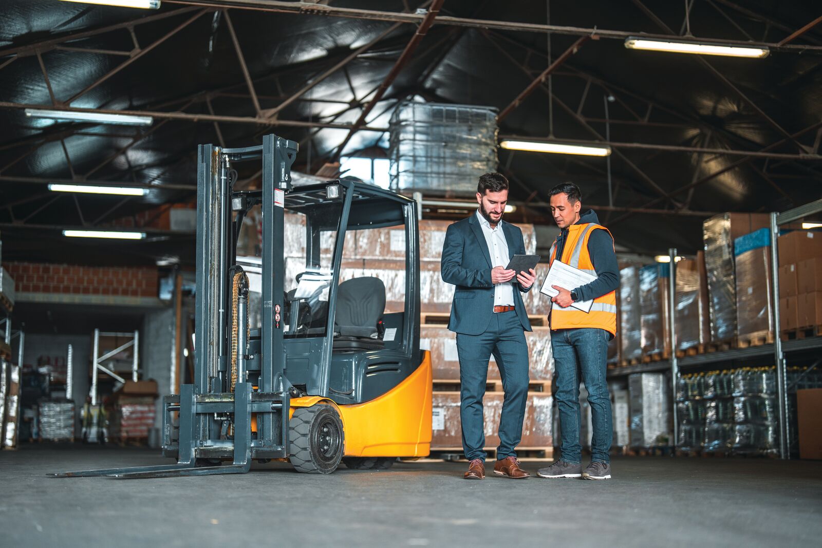Two men in warehouse